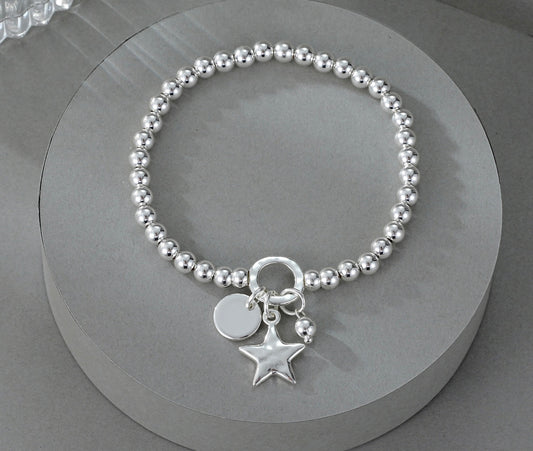 Silver Beaded Star and Medallion Bracelet